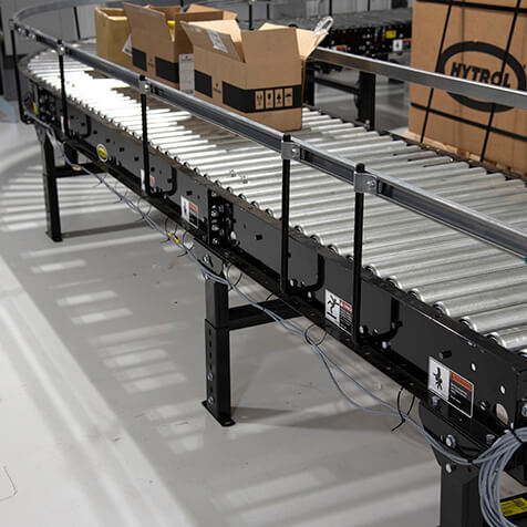 Accumulation conveyors accumulate with minimum or no drive pressure.