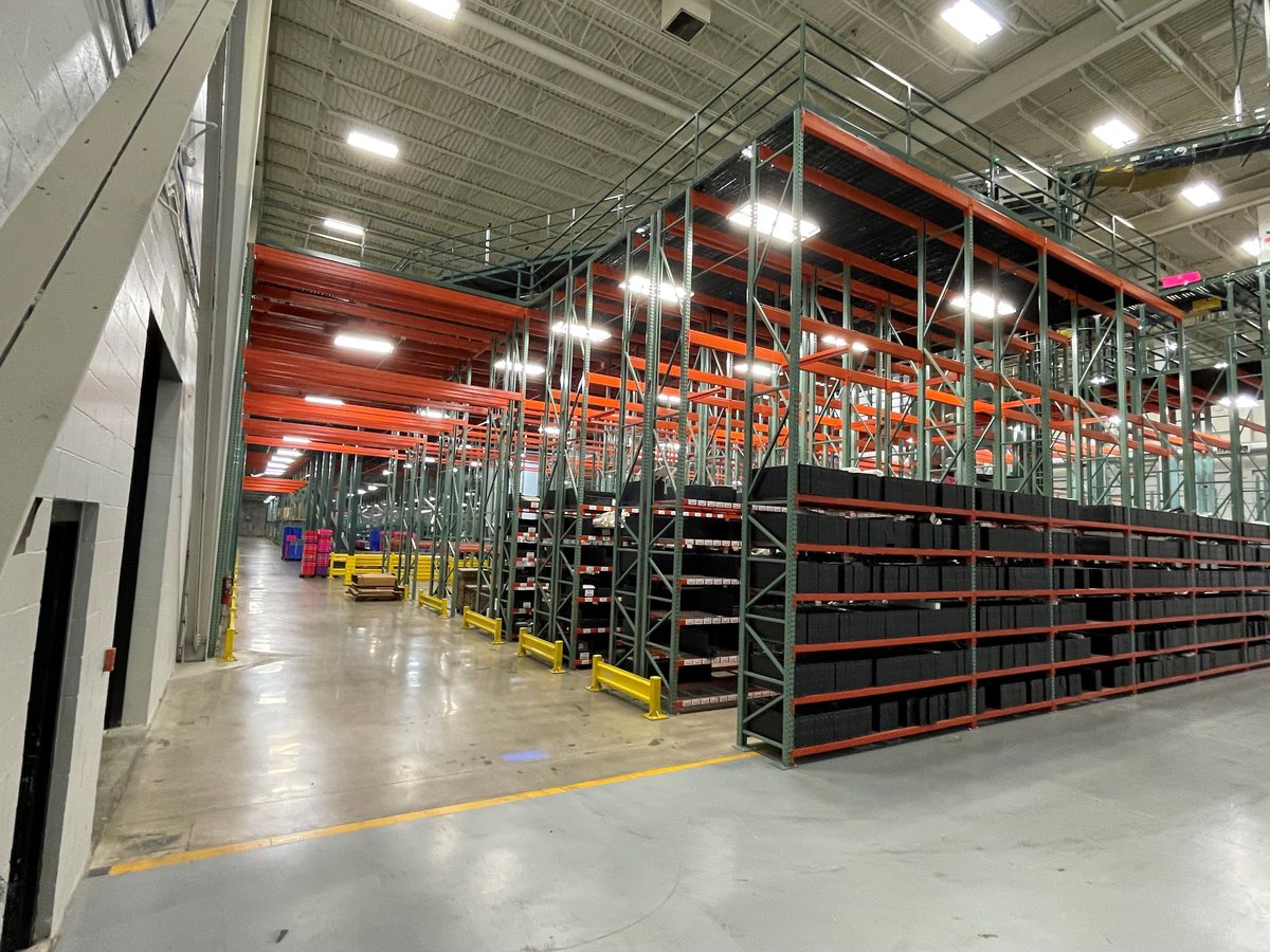 Rack supported platform above the distribution floor